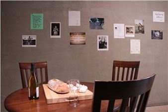Jonas Mekas: A small table with a bottle of wine, garlic, sausage, bread - Microscope Gallery