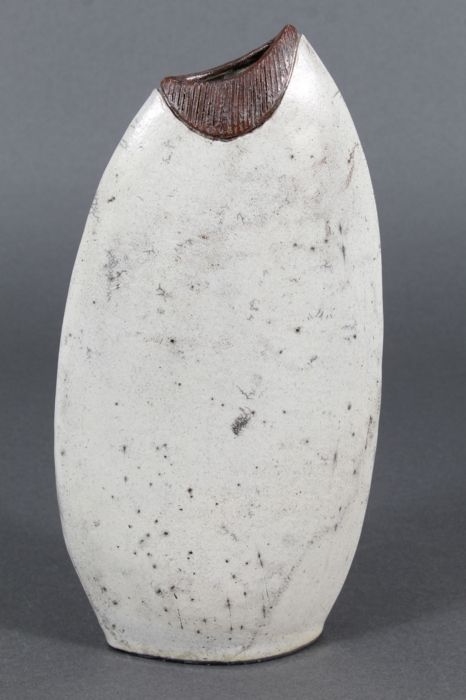 Artwork by Wyman Rice, Vase, Made of Raku Fired Pottery. Hand-Built Slab Construction, Carved Upper Rim Banding