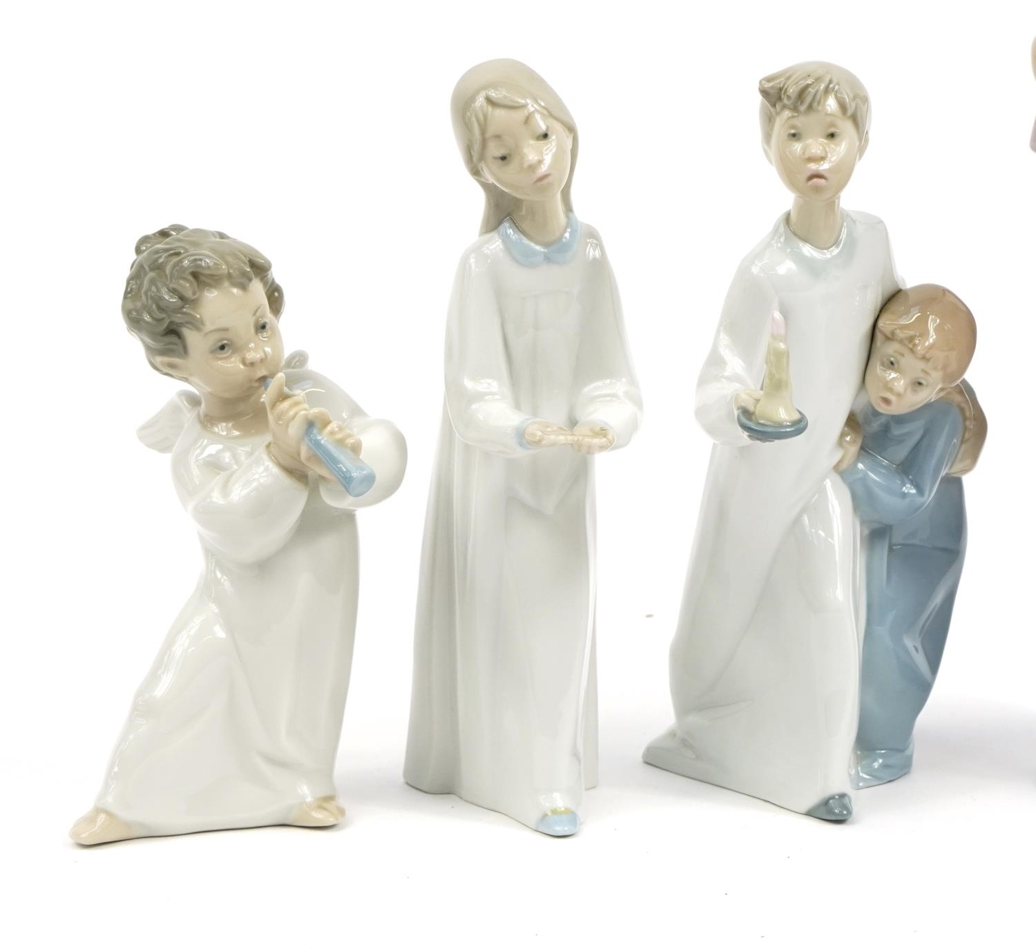 Lladró S.A Six Lladro and Nao figures and figurines including a large
