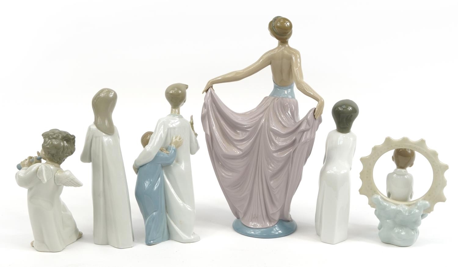Lladró S.A Six Lladro and Nao figures and figurines including a large