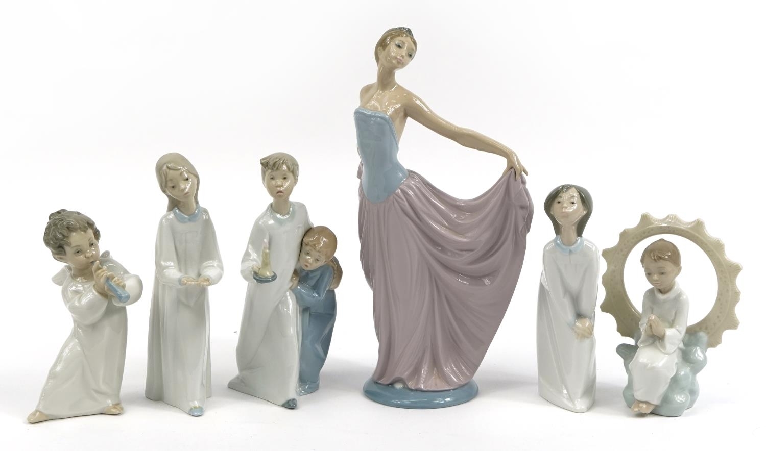 Lladró S.A Six Lladro and Nao figures and figurines including a large