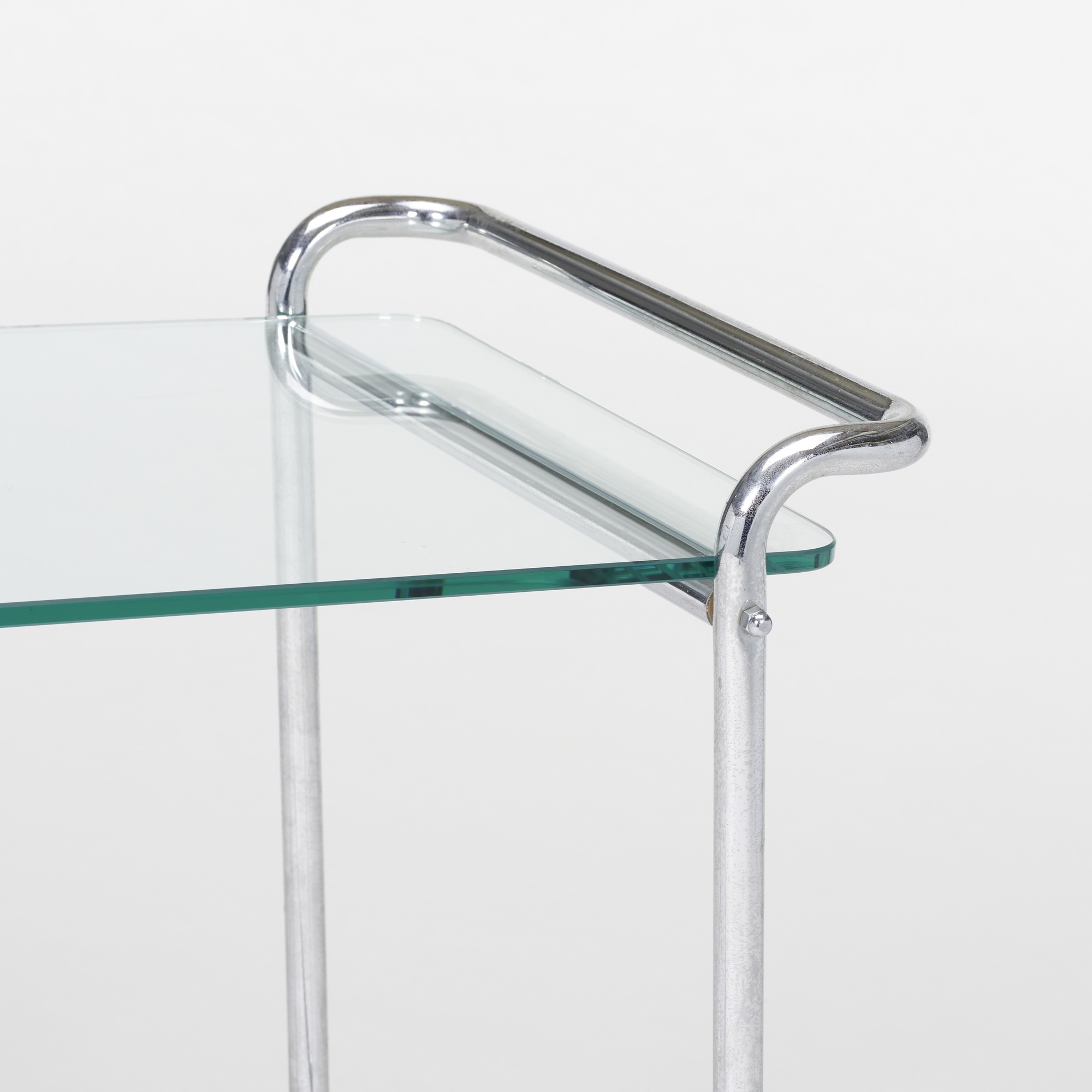 Artwork by Emile Guyot, Occasional table, model B152, Made of chrome plated steel, glass
