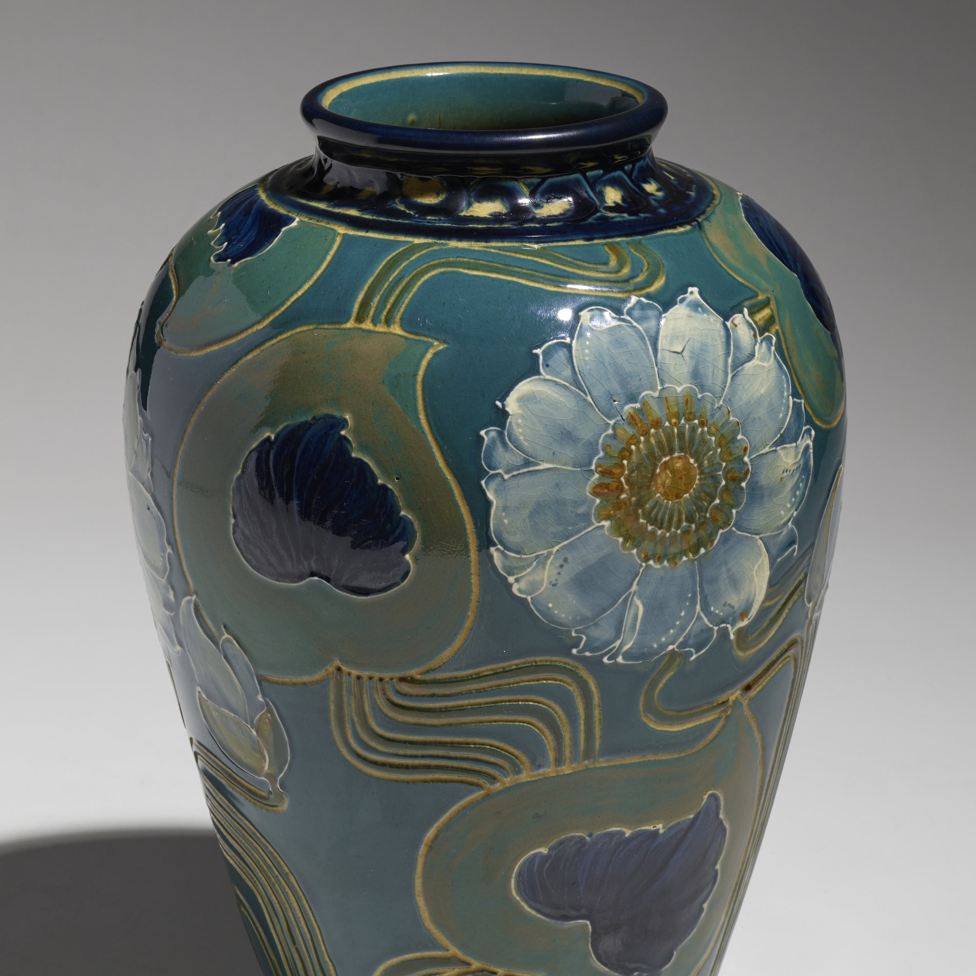 Frederick Hurten Rhead | Faience vase with flowers (Circa 1903) | MutualArt