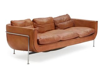 A three seater sofa upholstered with cognac coloured leather - Jacques Brule