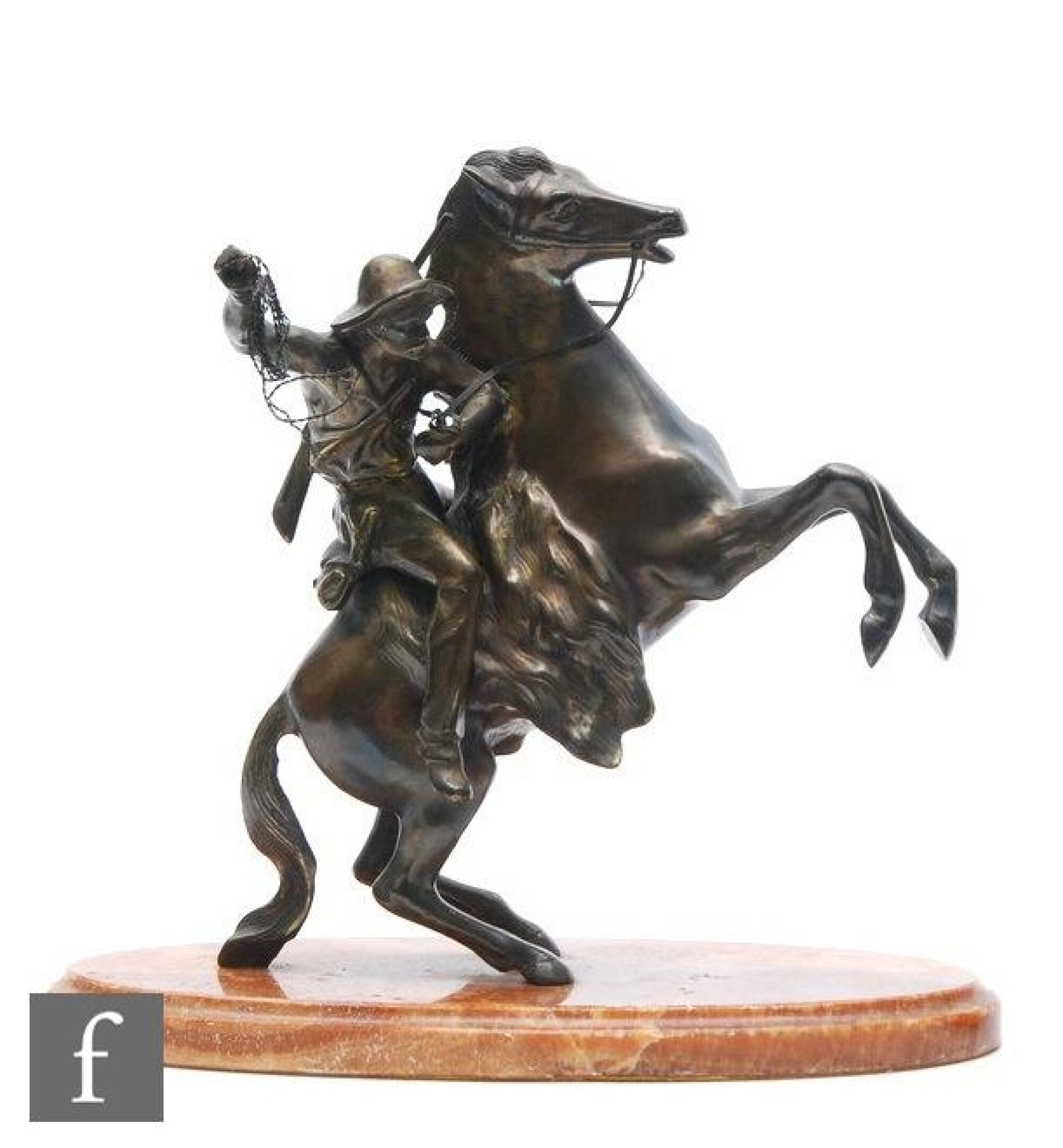 Frederic Remington A bronze figure of a cowboy on horseback MutualArt