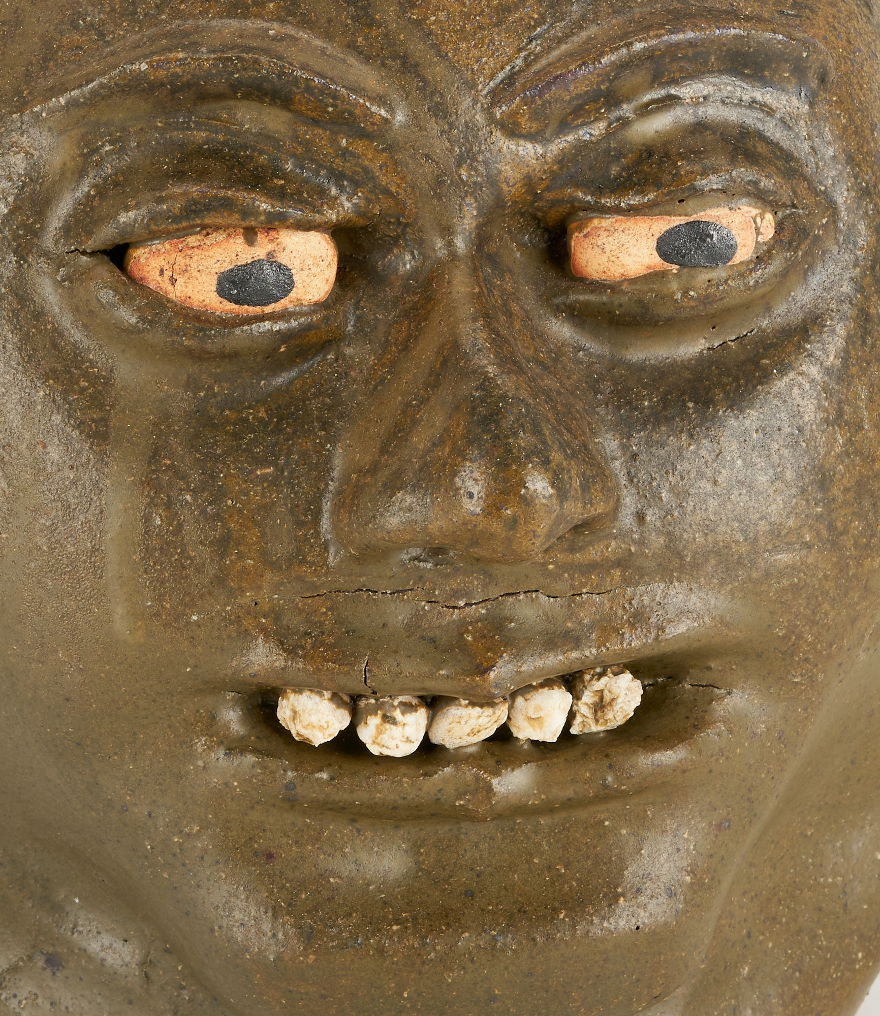 Artwork by Lanier Meaders, Lanier Meaders Folk Art Pottery Double Face Jug, Made of green matte glaze with