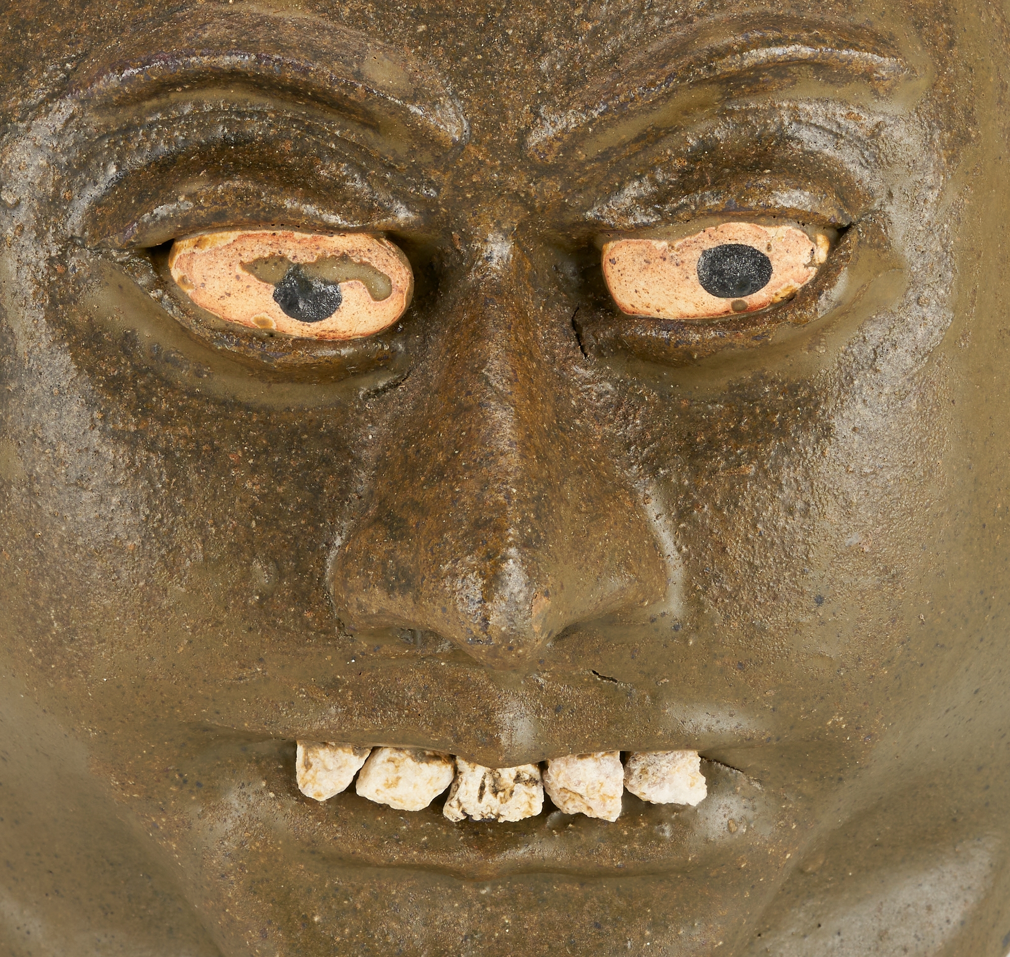 Artwork by Lanier Meaders, Lanier Meaders Folk Art Pottery Double Face Jug, Made of green matte glaze with