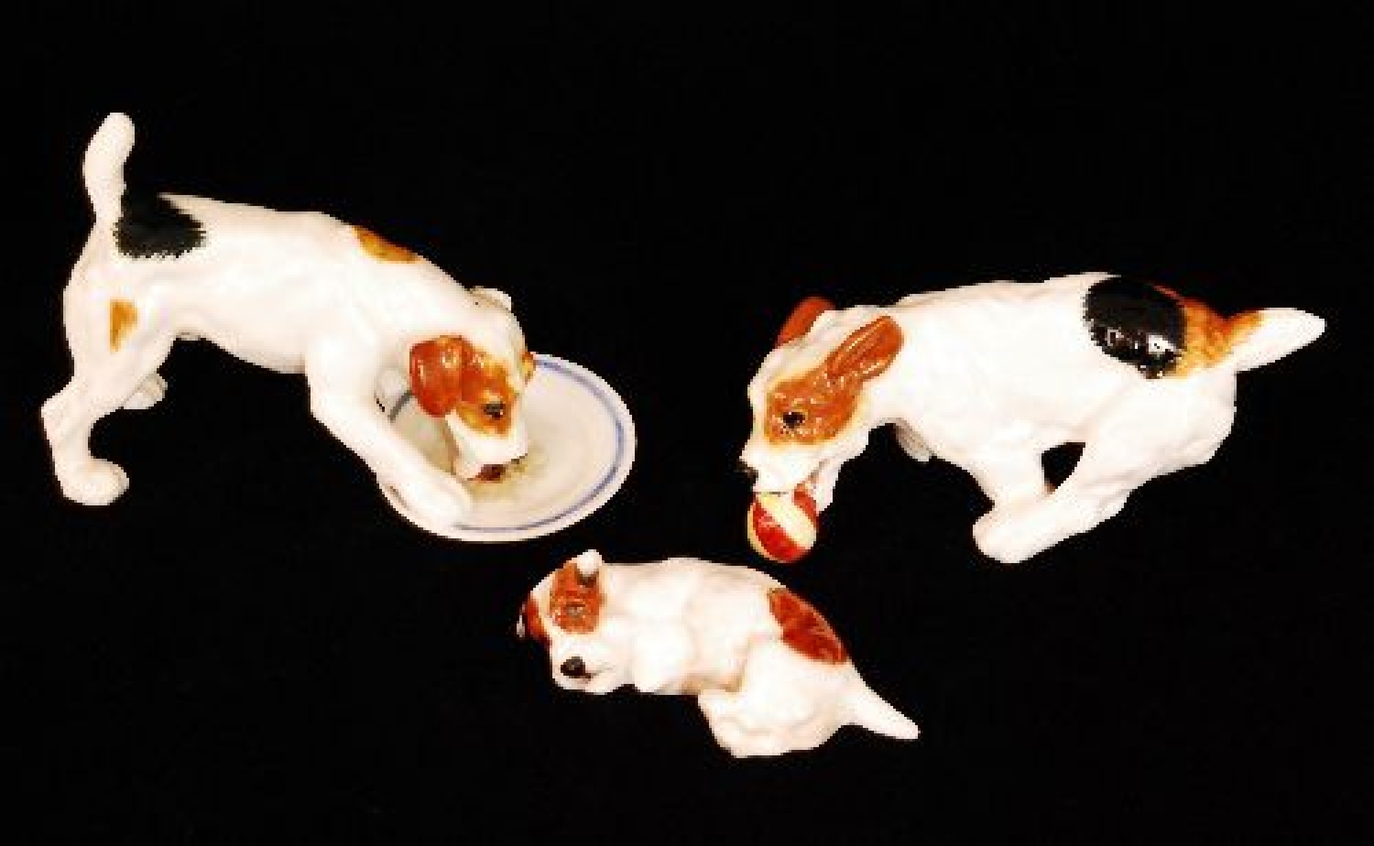 Royal Doulton A trio of Royal Doulton terrier figures to include one