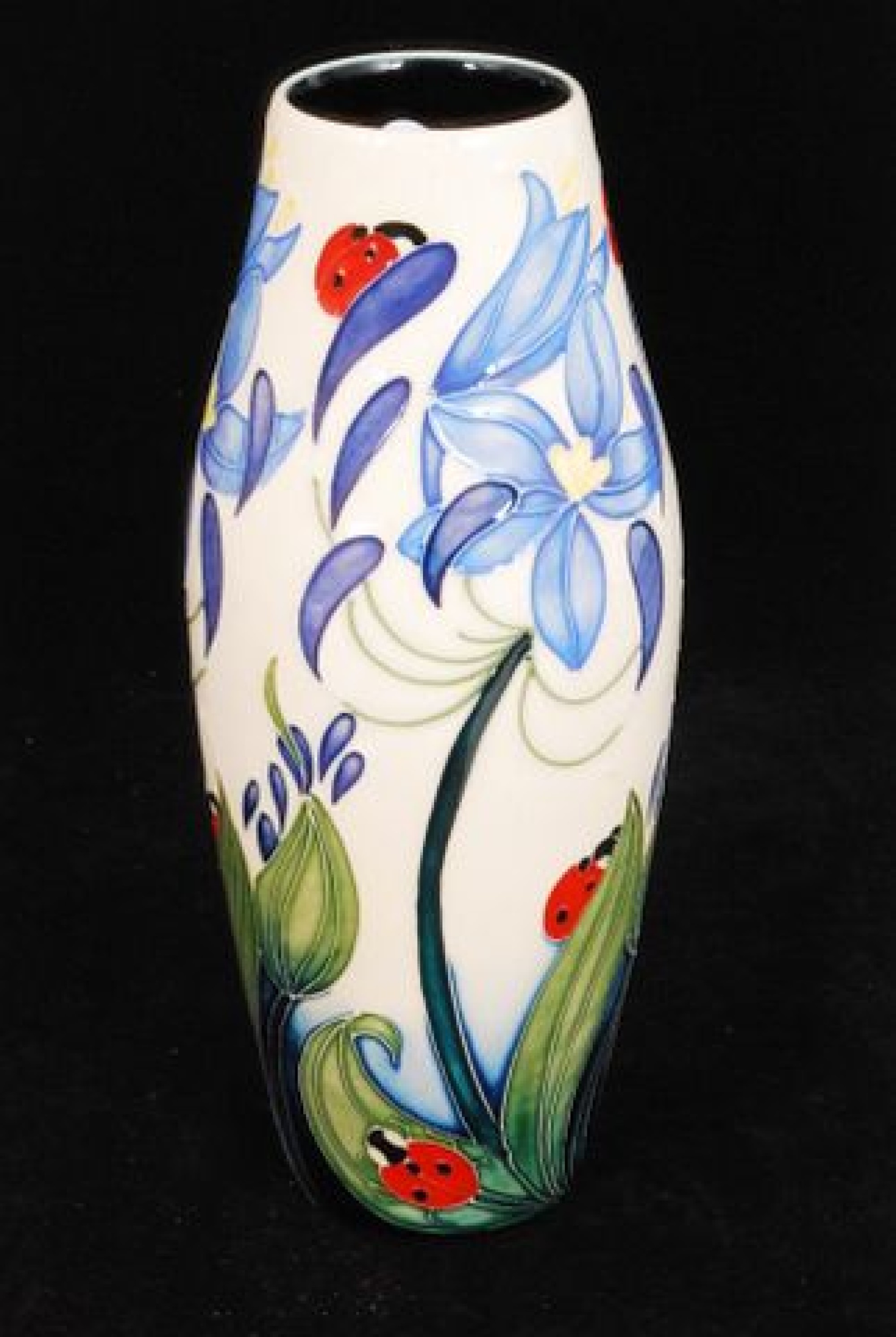 William Moorcroft A Moorcroft Pottery cylindrical vase decorated with