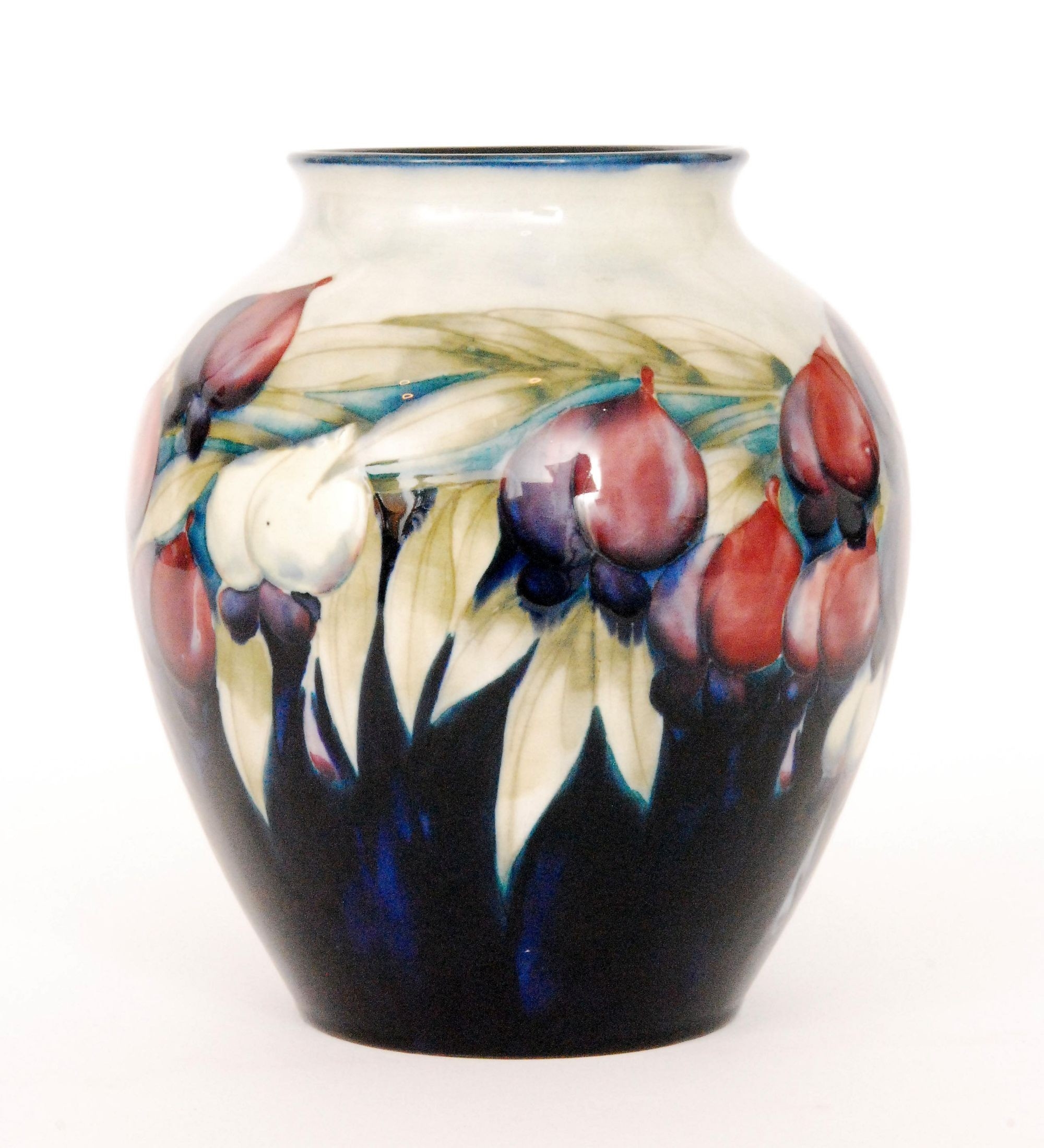 William Moorcroft A William Moorcroft vase of ovoid form decorated in