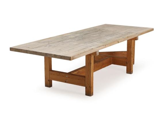 A solid pine dining table with foldable leaf by Tage Poulsen