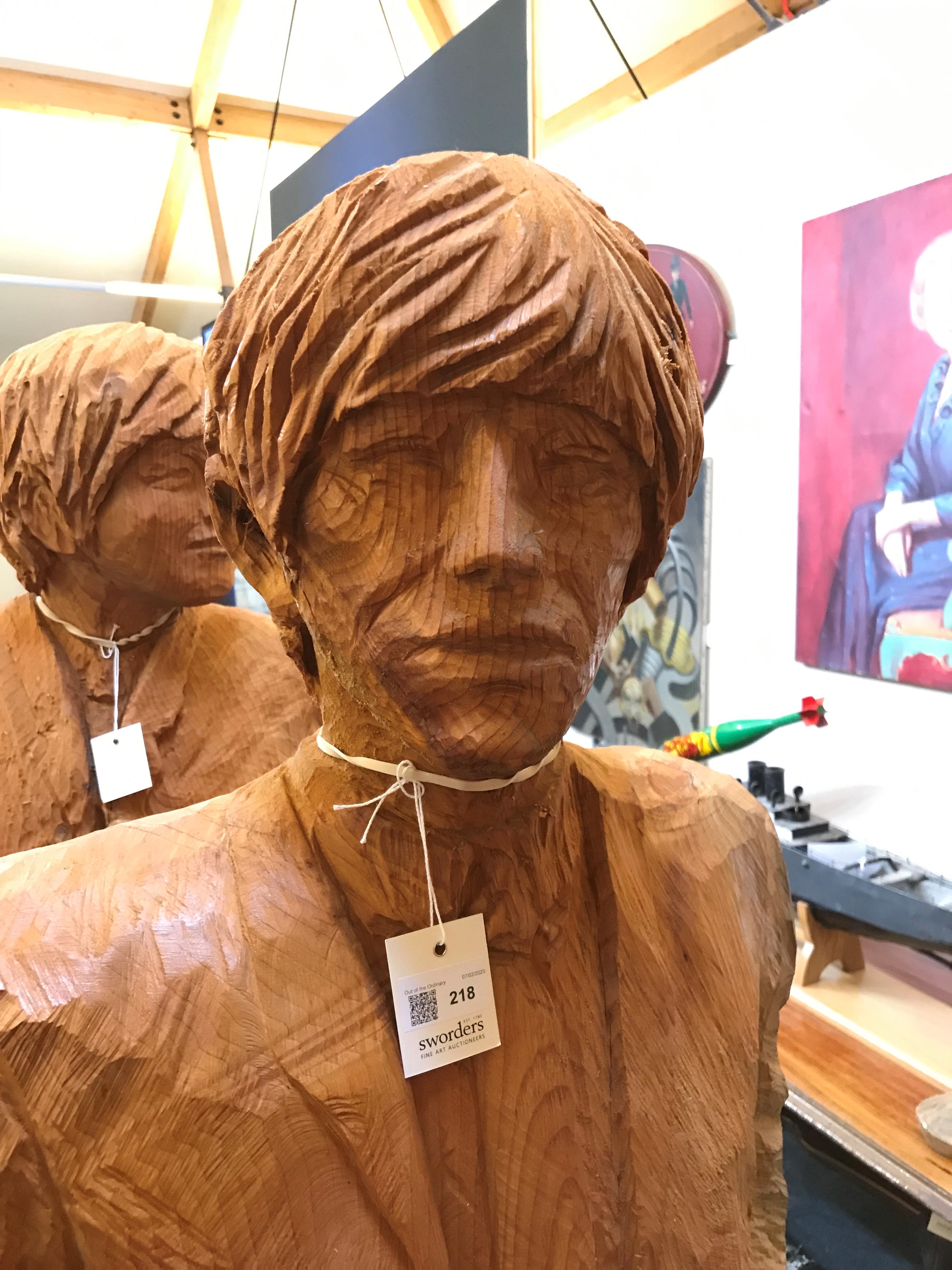 Simon O'Rourke | The Beatles 2017 a group of four life-sized chainsaw ...