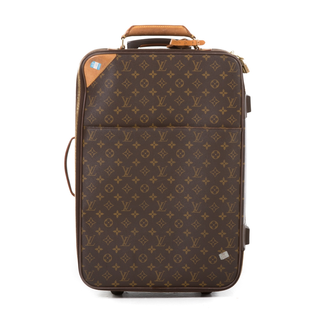 Louis Vuitton, A Louis Vuitton Keepall leather travel bag with luggage tag  width 13cm