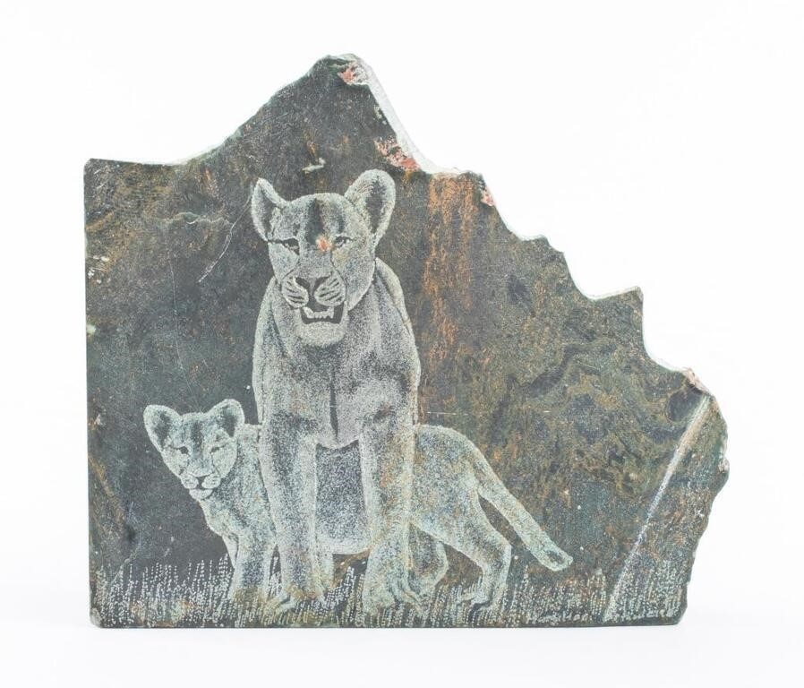 Artwork by Justie Mashile, Walking lioness, one with a lioness and cub, and the last with a lion, Made of green stone