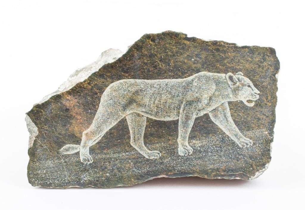 Artwork by Justie Mashile, Walking lioness, one with a lioness and cub, and the last with a lion, Made of green stone