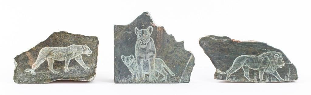 Artwork by Justie Mashile, Walking lioness, one with a lioness and cub, and the last with a lion, Made of green stone