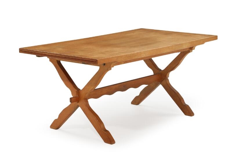 Henning Kjaernulf | An oak dining table with Dutch extension | MutualArt