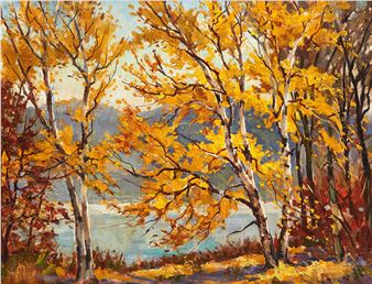 A vibrant autumn landscape featuring golden birch trees framing a serene lake.