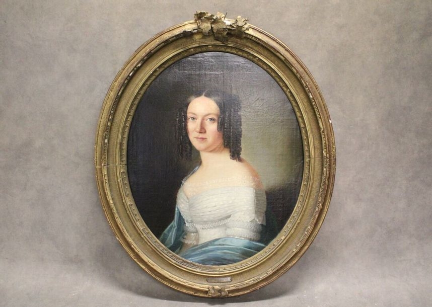 Portrait of a woman in an oval frame in carved and molded wood by Anton Einsle
