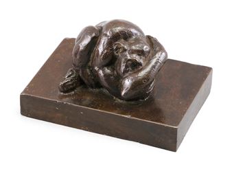 Reclining monkey on a rectangular base. - Eleanor Stillman