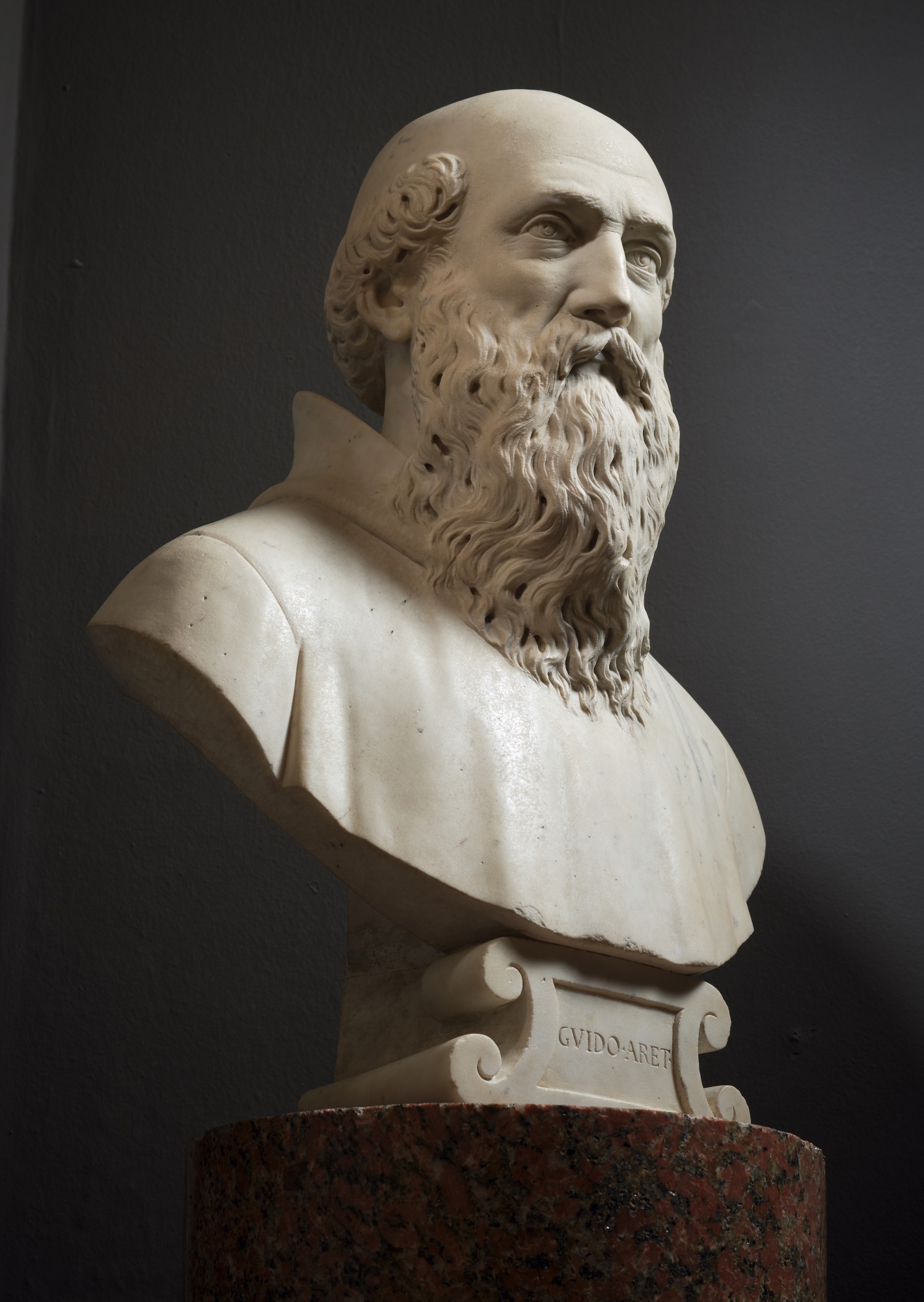 Artwork by Agostino Zoppo, Bust of Guido of Arezzo, Made of marble