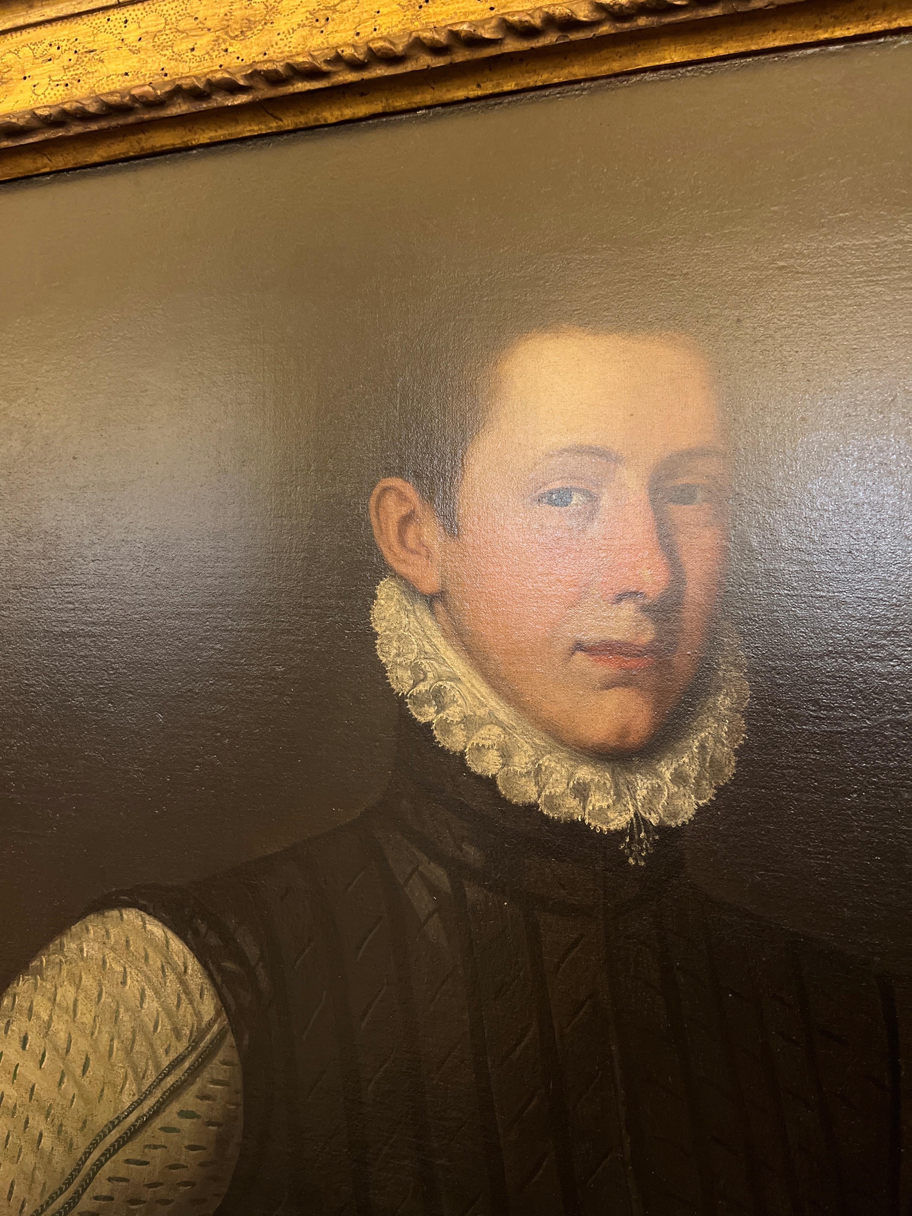 Artwork by Giovanni Battista Moroni, Portrait of a young nobleman standing three-quarter-length in a black striped doublet with ivory sleeves and lace ruff, Made of oil on canvas