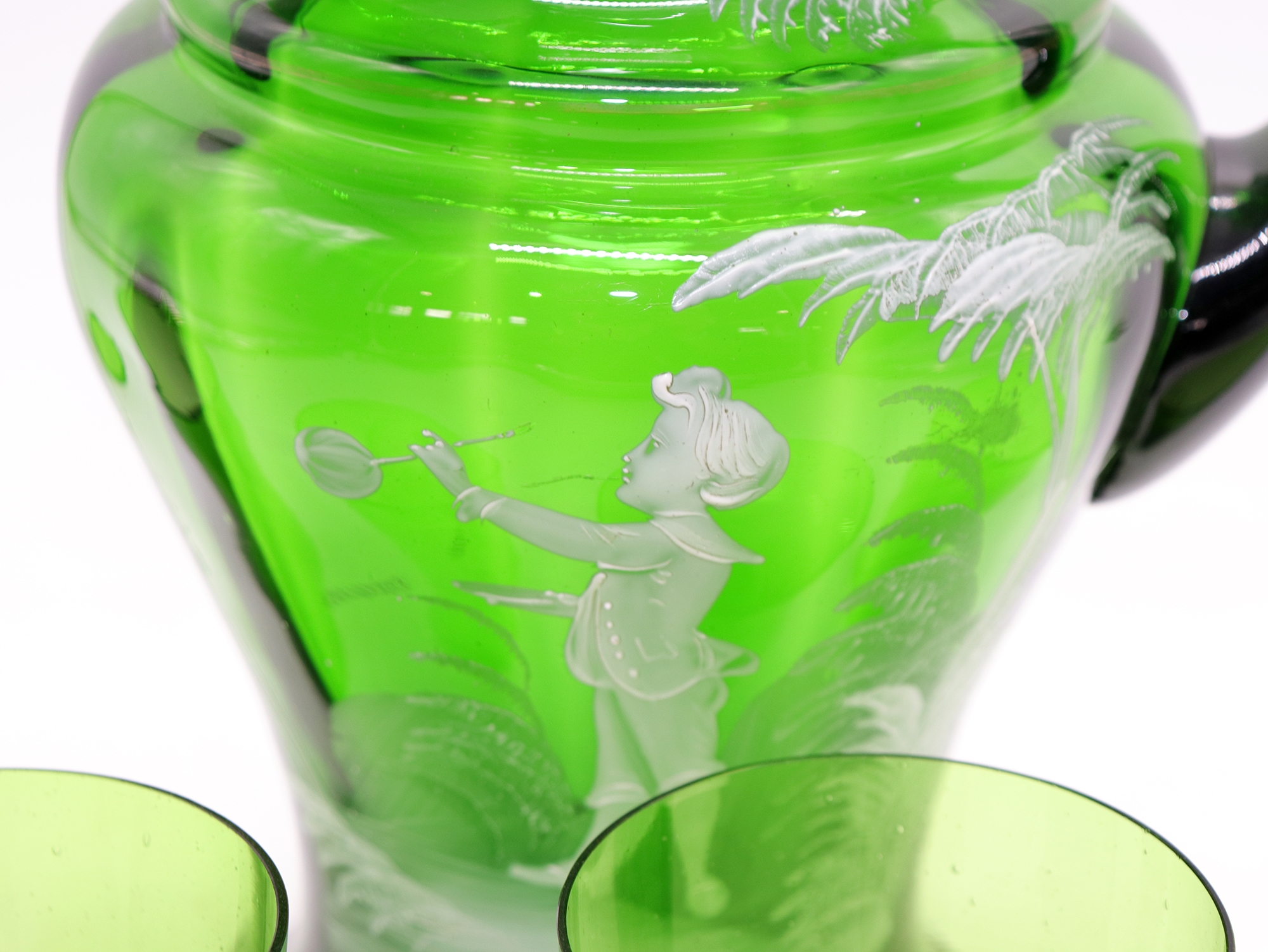 Artwork by Mary Gregory, Rare antique Mary Gregory green glass drinking set, Made of green glass