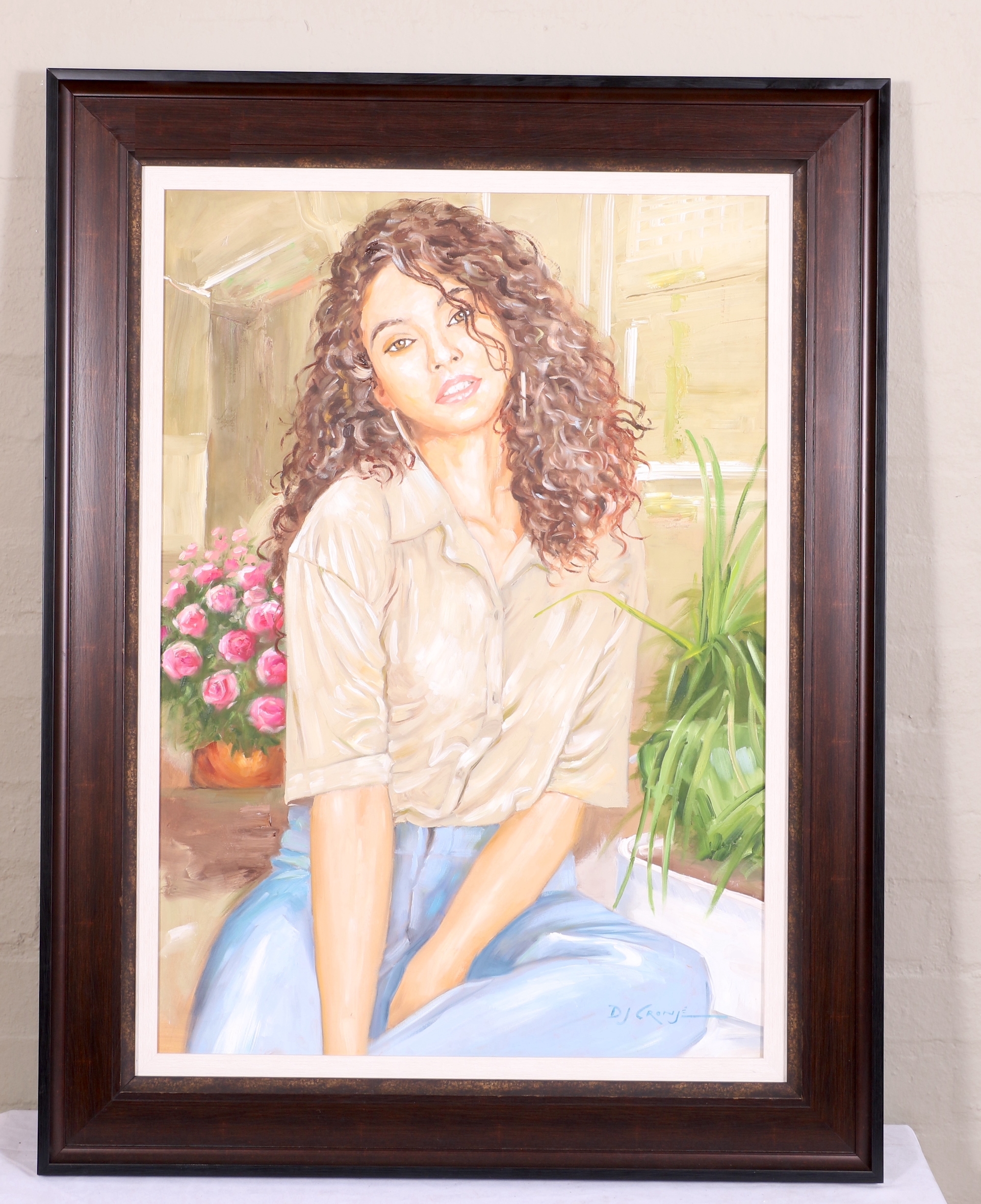 Artwork by Danie Cronje, SEATED WOMAN IN BLUE JEANS, Made of oil on canvas on board