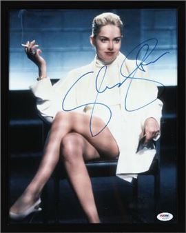 A signed colour still photograph of the American actress Sharon Stone - Jan de Bont