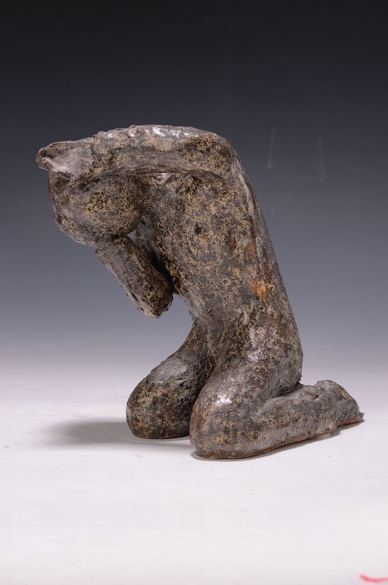 Artwork by Elsa Meisel, the beaten man, Made of ceramic, metal