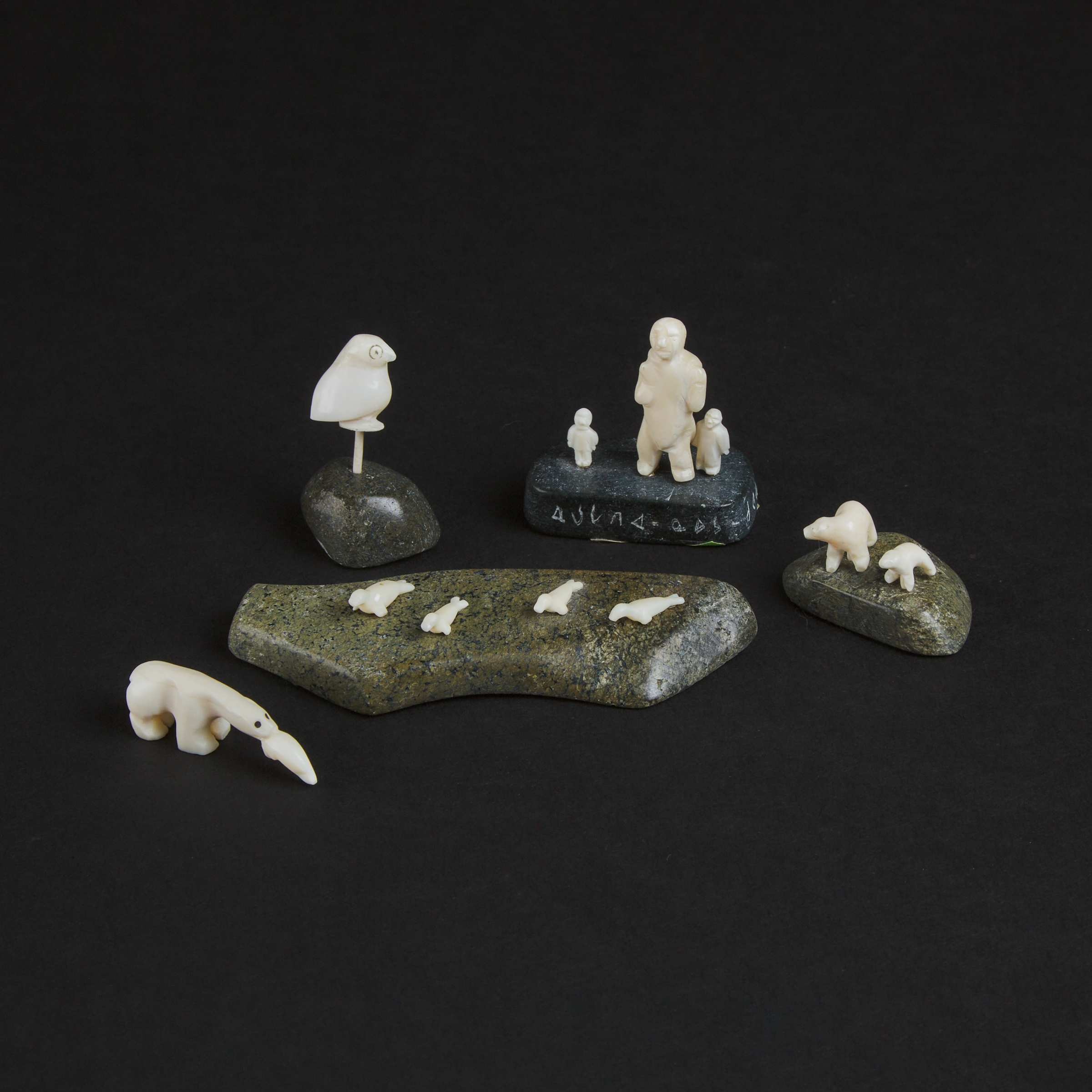 Artwork by Madeleine Isserkut Kringayark, THREE ARCTIC SCENES AND ANIMALS, Made of ivory, stone