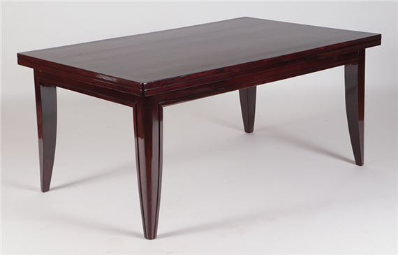 A rosewood dining table by Dominique C 1925 with two leaves and a nice French polish. by Maison Dominique, circa 1925