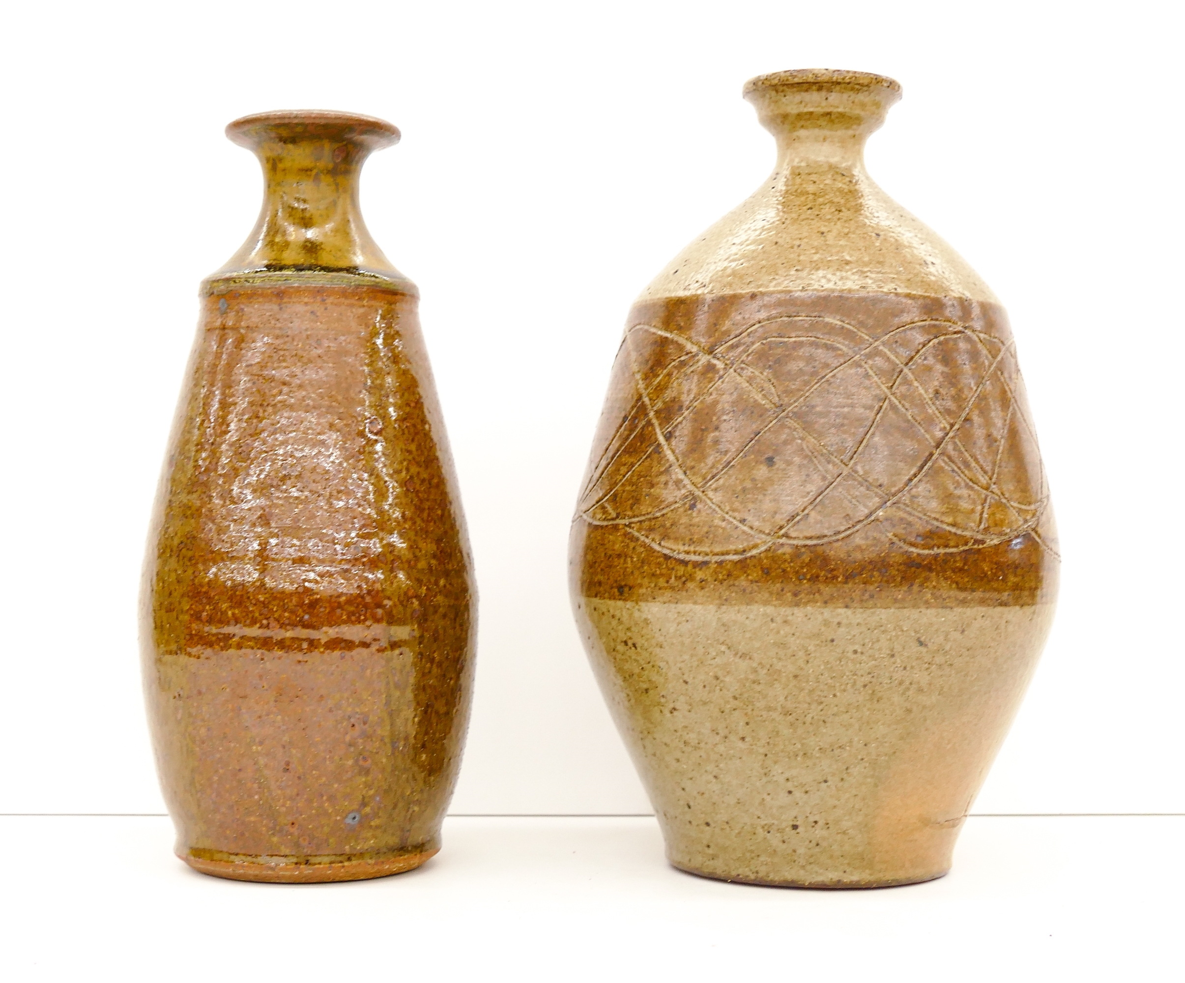 Artwork by Jerry Glenn, 2pc Jerry Glenn Decorated Stoneware Vases 10'' and 11'', Made of Stoneware