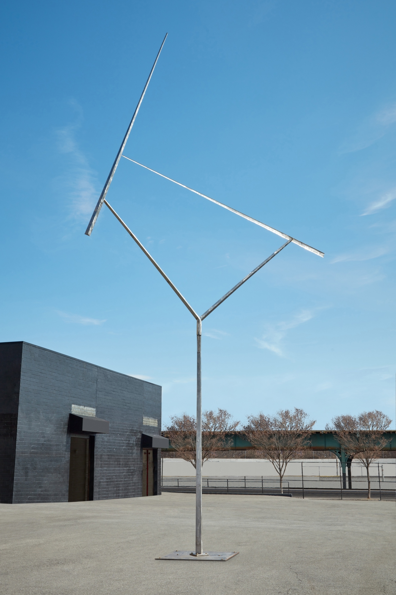 Artwork by George Rickey, Two Lines Oblique Gyratory, Made of stainless steel