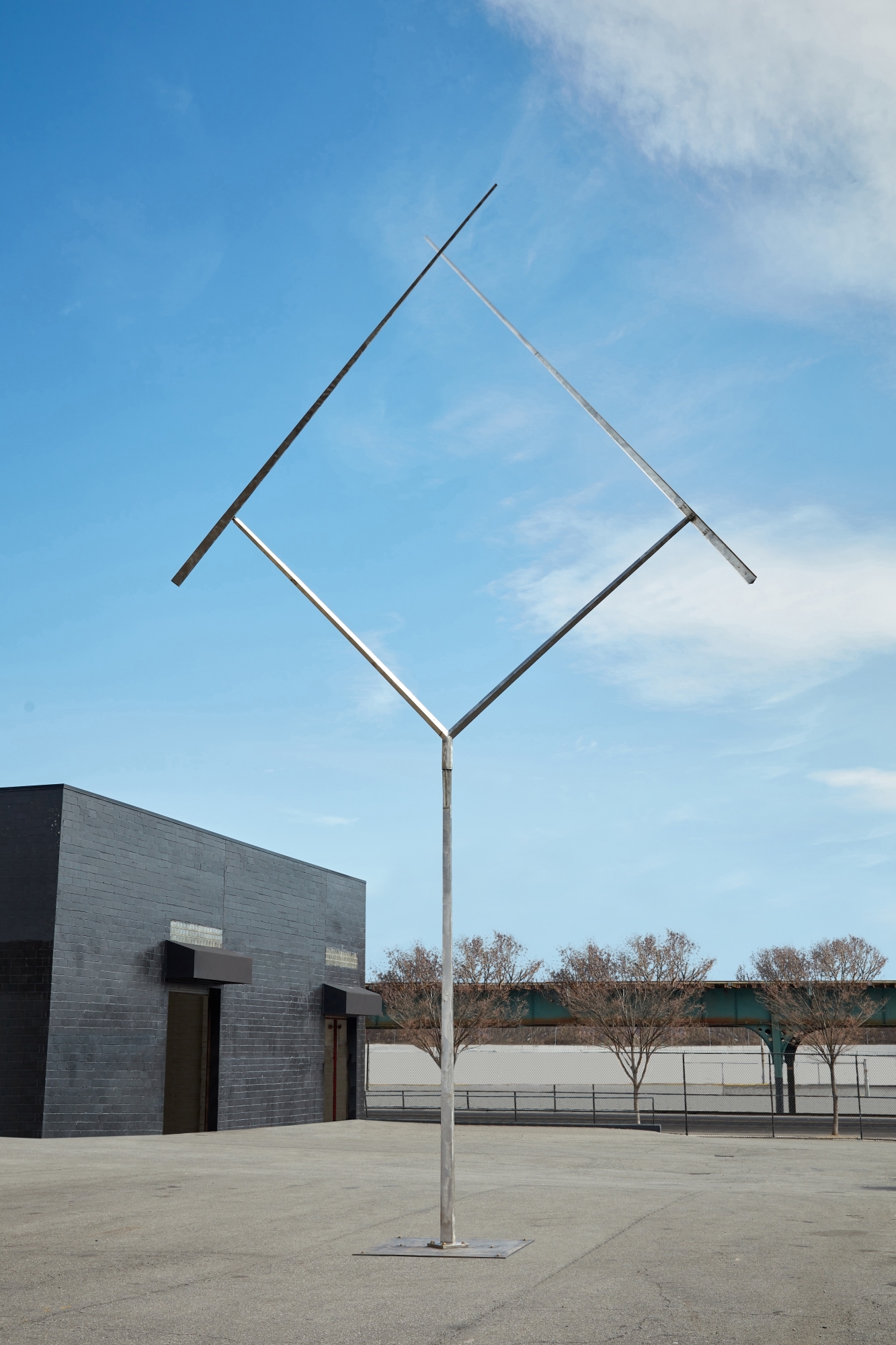 Artwork by George Rickey, Two Lines Oblique Gyratory, Made of stainless steel