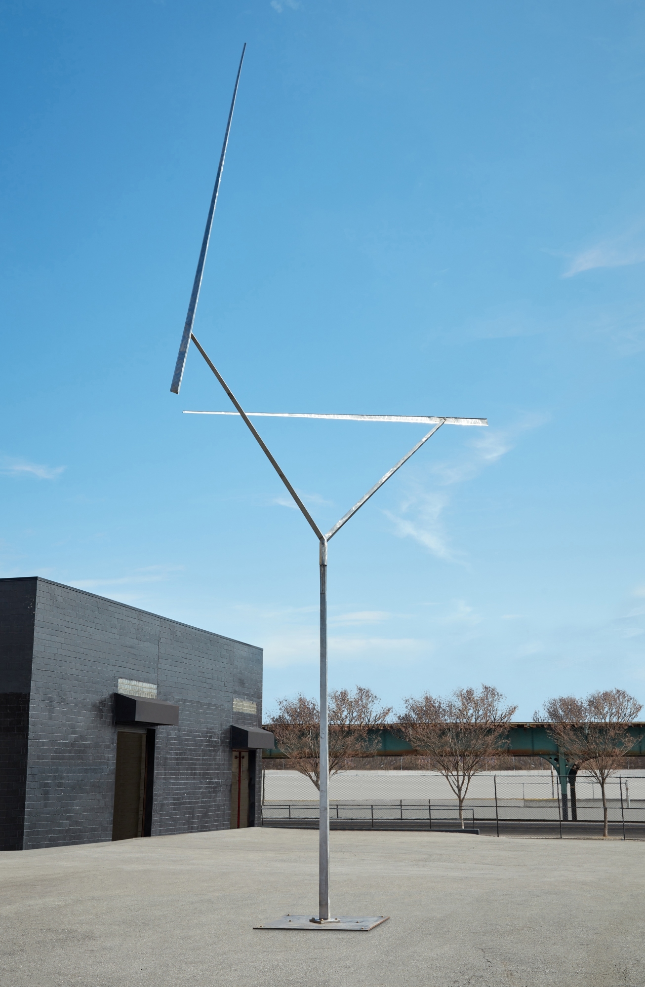 Artwork by George Rickey, Two Lines Oblique Gyratory, Made of stainless steel