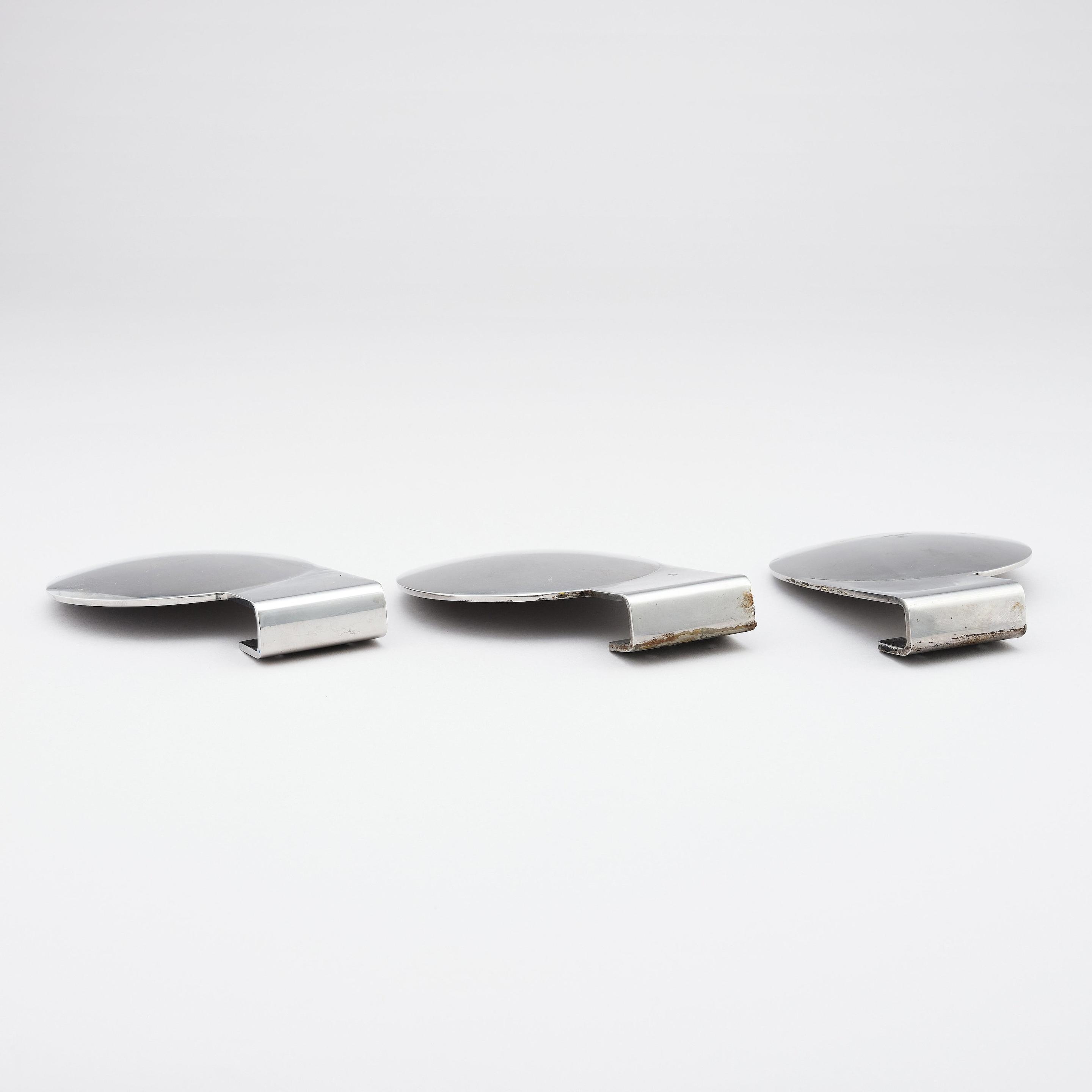 Artwork by Eskil Sundahl, Three door handles, from the City hall of Sundbyberg, by Eskil Sundahl och Artur von Schmalensee, for the Co/op 1930., Made of metal