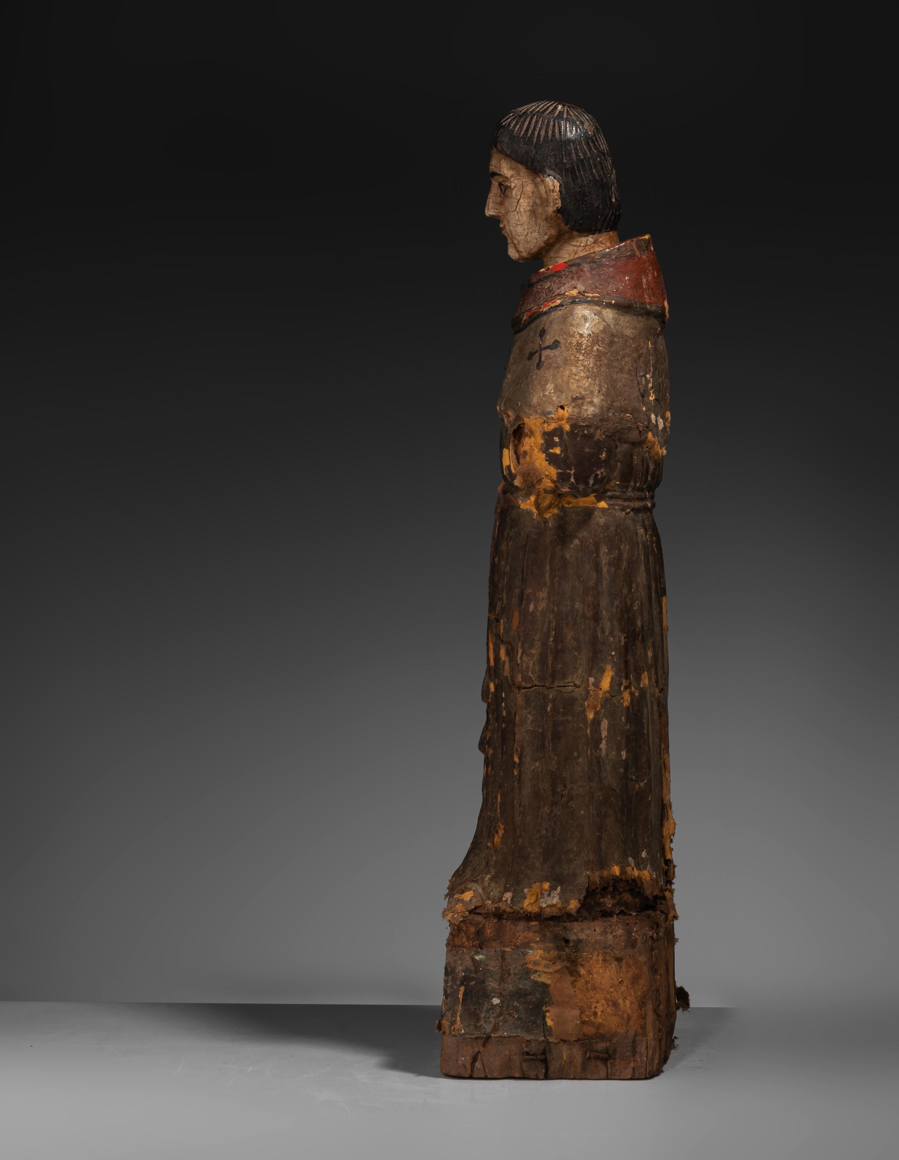 European School | A polychrome wooden sculpture of a saint | MutualArt