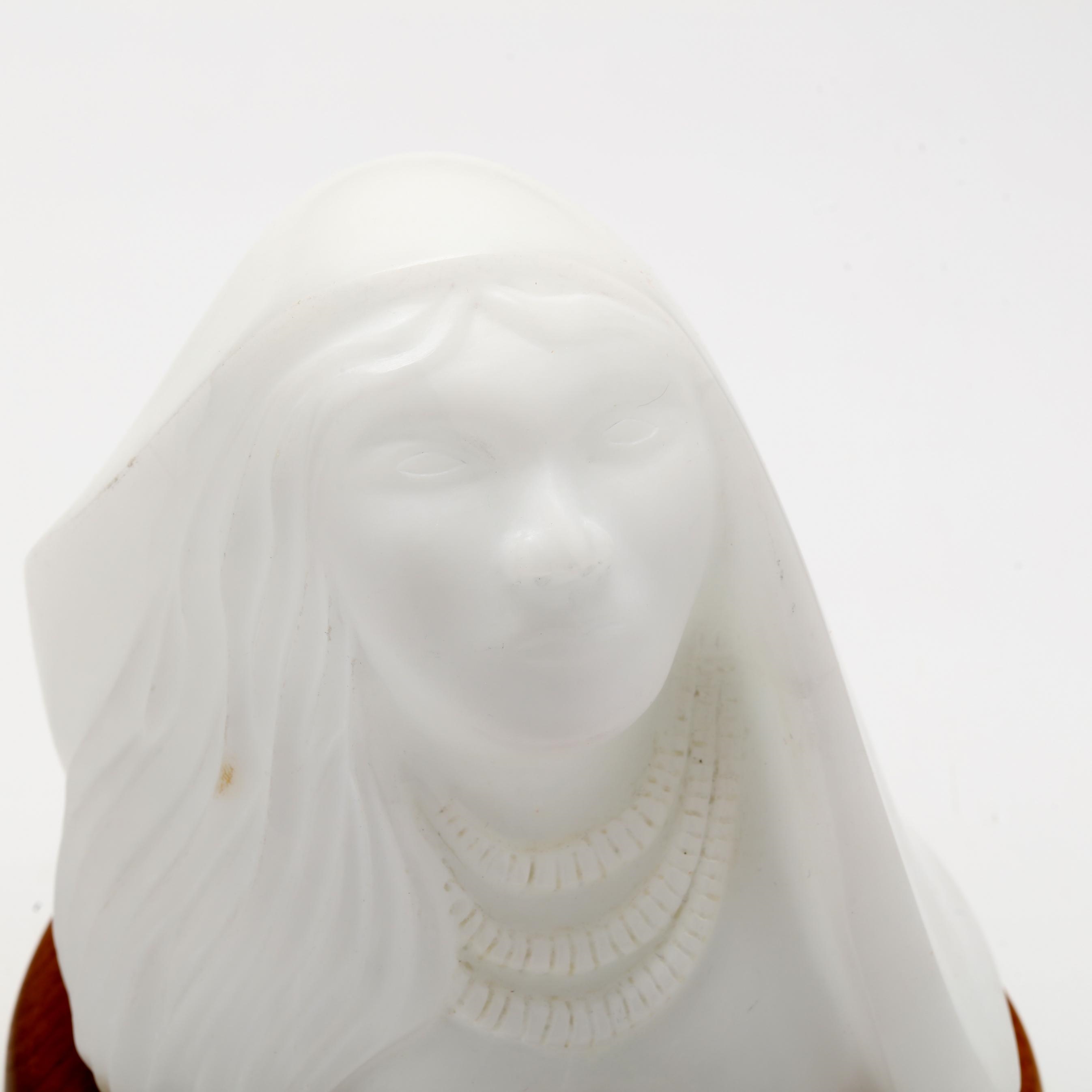 Artwork by Robert Dale Tsosie, Carved Stone Bust, Made of carved and polished white stone