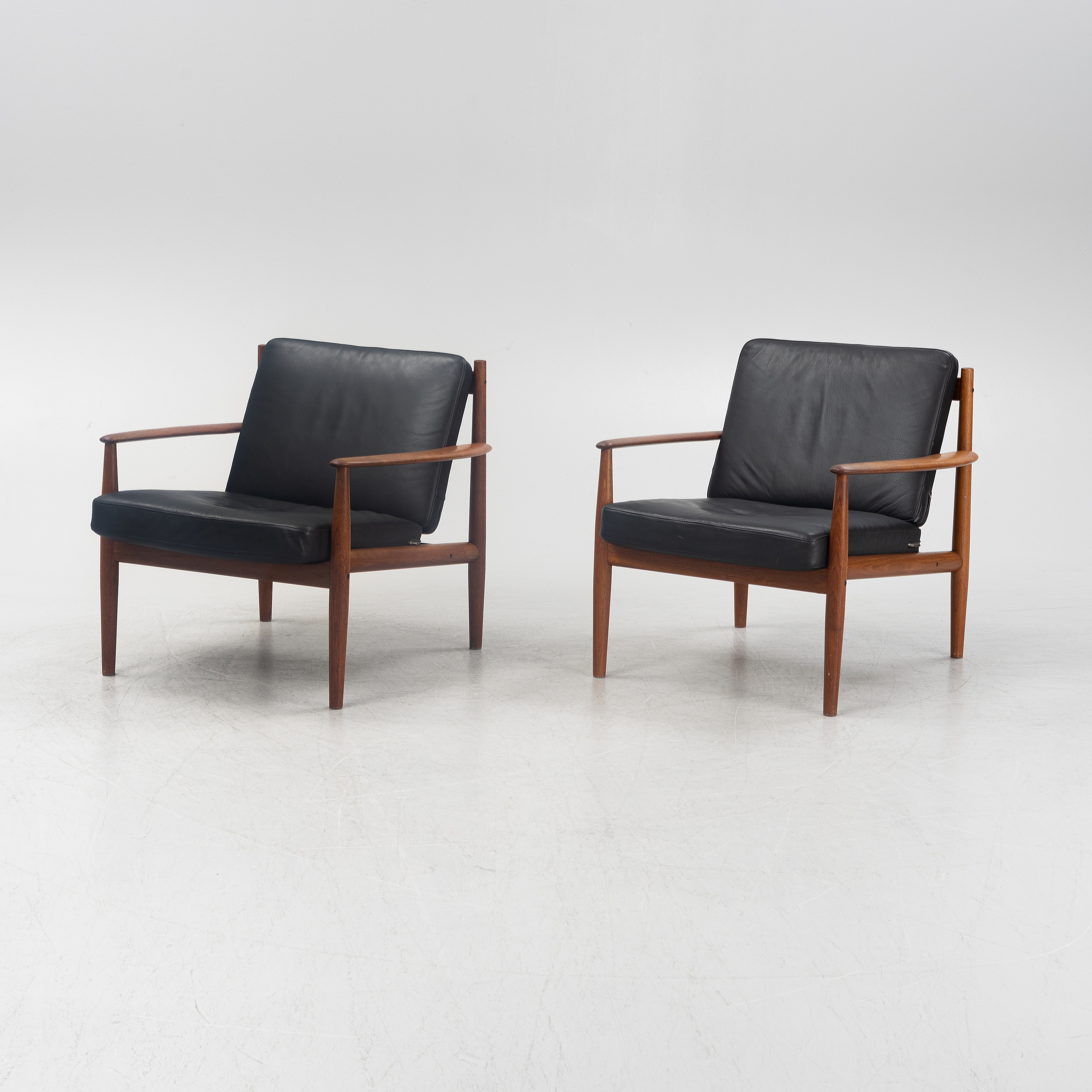 a pair of model '118' teak easy chairs, France & Son, Denmark, 1960's by Grete Jalk, 1960