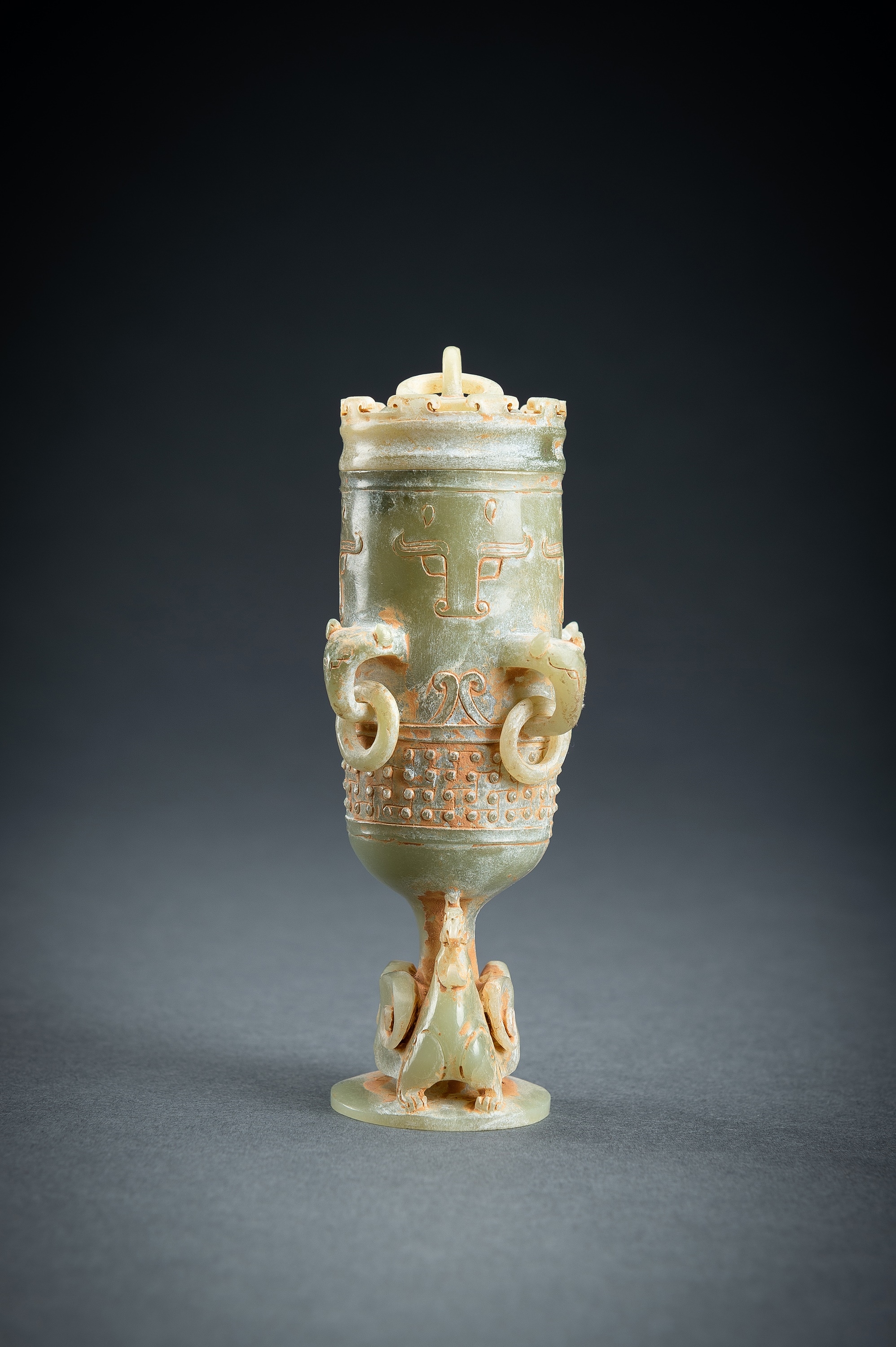 Artwork by Han Dynasty, A SMALL ARCHAISTIC CELADON JADE VASE AND COVER, Made of translucent stone