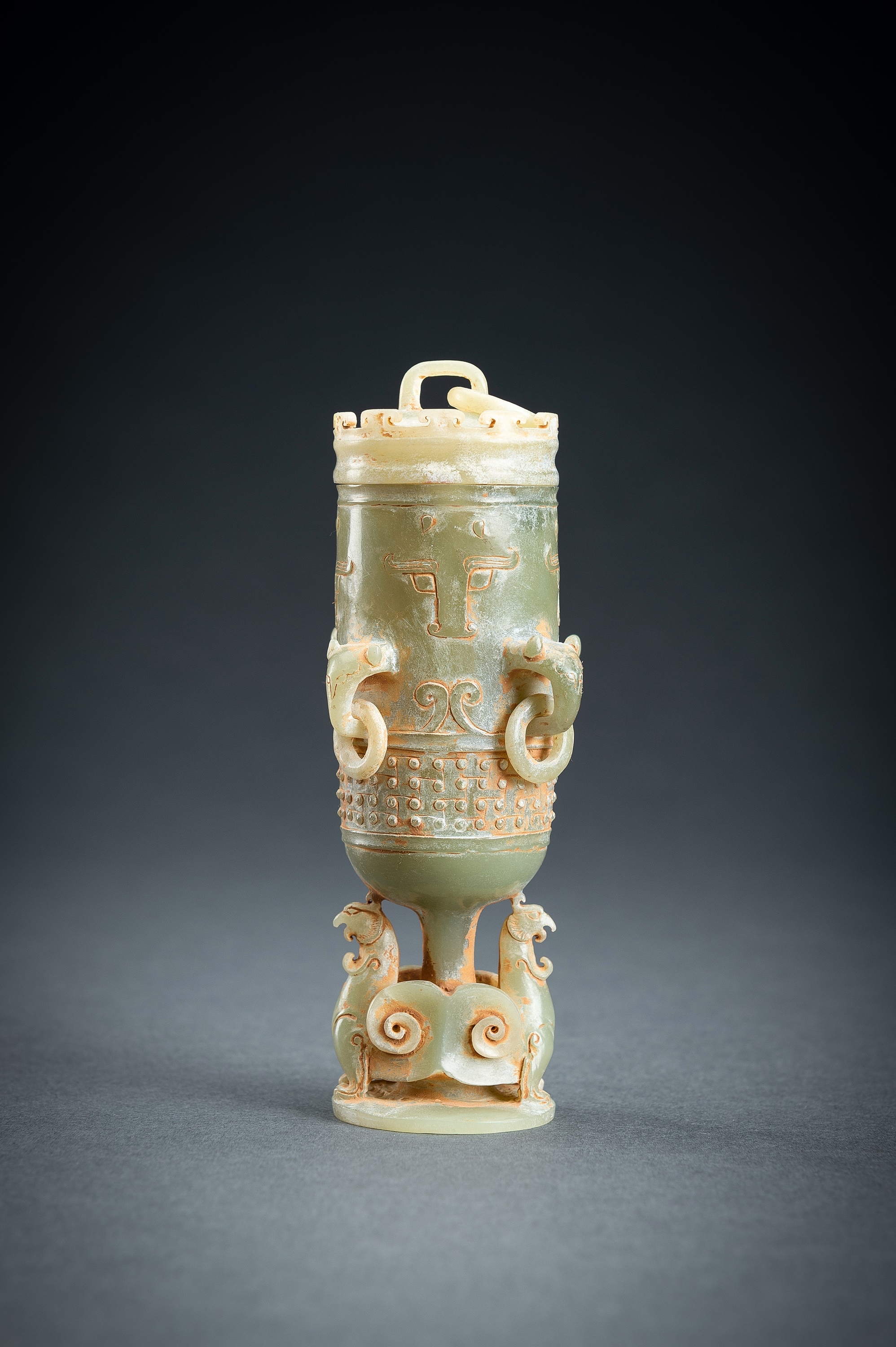 Artwork by Han Dynasty, A SMALL ARCHAISTIC CELADON JADE VASE AND COVER, Made of translucent stone
