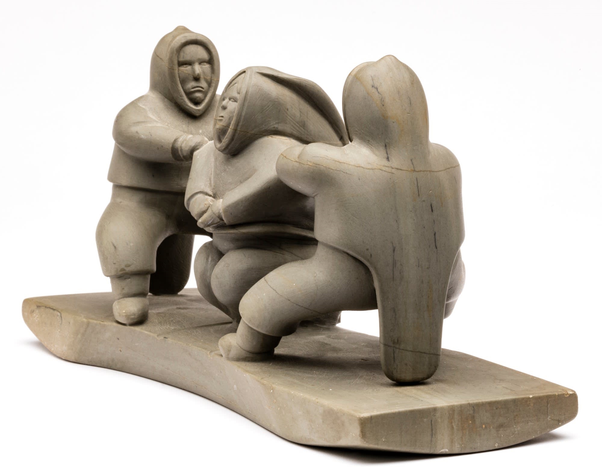 Artwork by Victor Ekootak, Fighting over a Woman, Made of stone