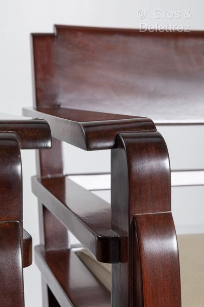 Artwork by André Domin, Marcel Genevrière, Armchairs with slightly curved bandeau backs, Made of stained mahogany