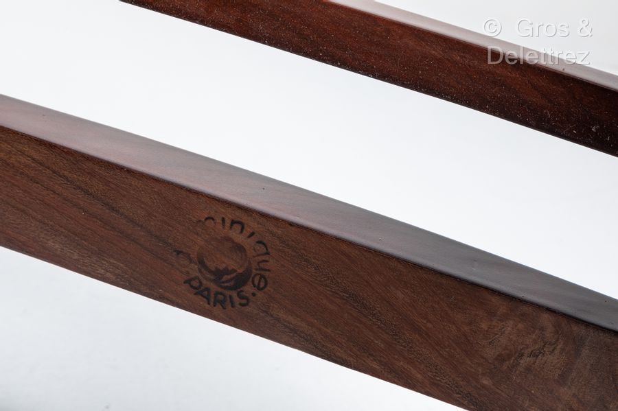 Artwork by André Domin, Marcel Genevrière, Armchairs with slightly curved bandeau backs, Made of stained mahogany