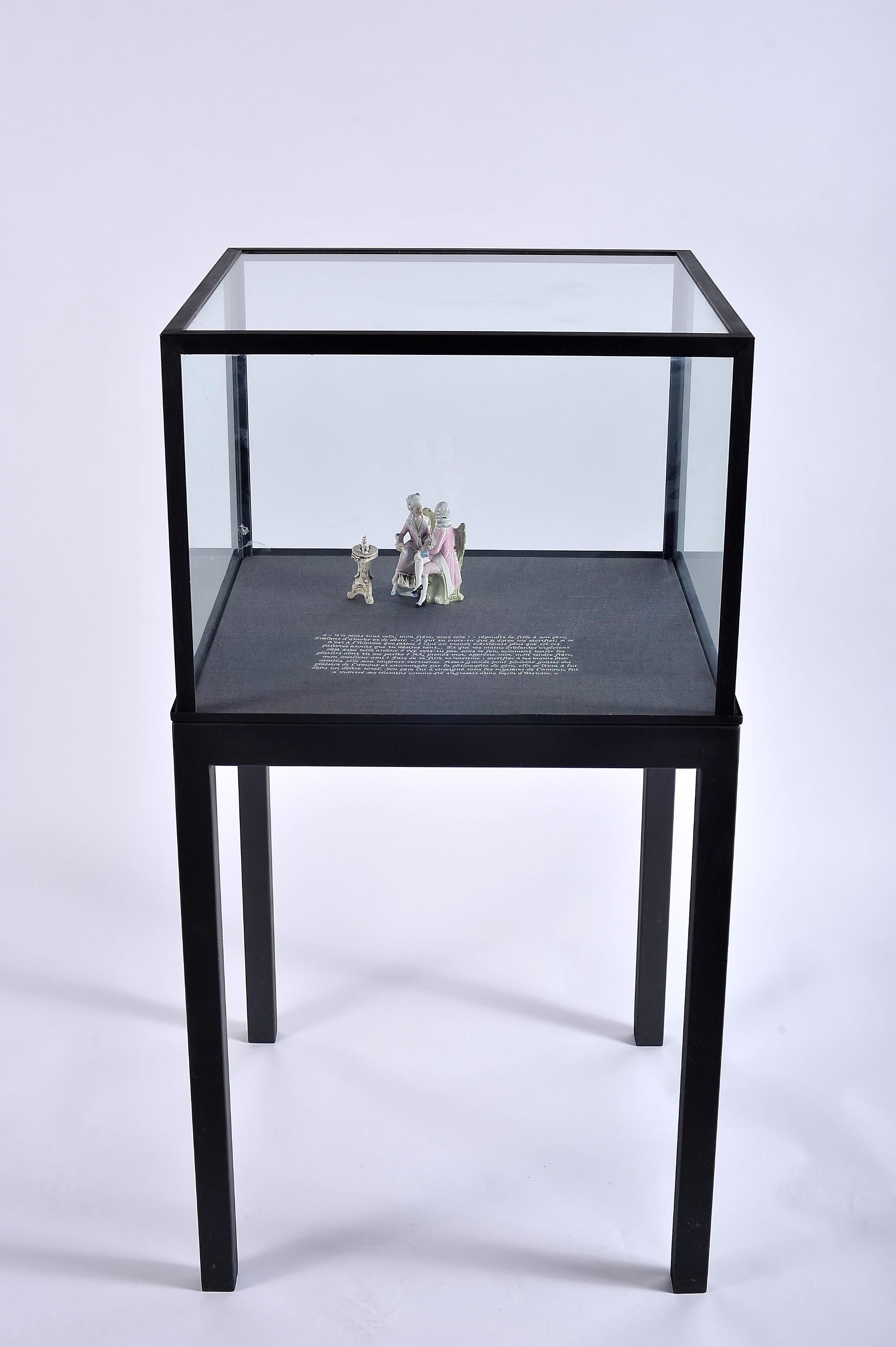 Artwork by Vasco Araújo, L'inceste, Made of metal, glass and porcelain display case