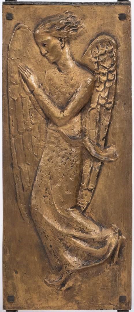 Artwork by Cephas Stauthamer, Representation of Jesus breaking bread at the Last Supper, Made of bronze and wrought-iron screen