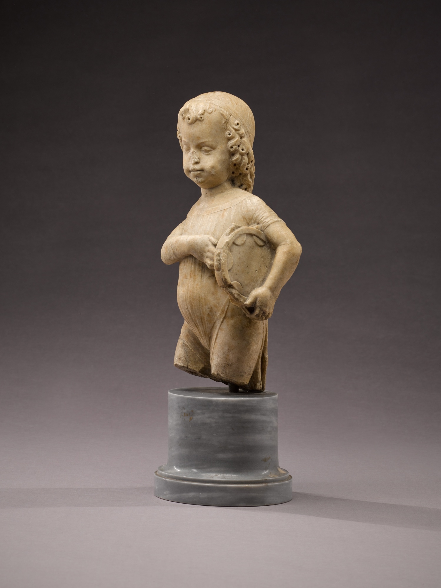 Artwork by Antonio Rizzo, Child with tambourine, Made of marble, on a later grey marble base