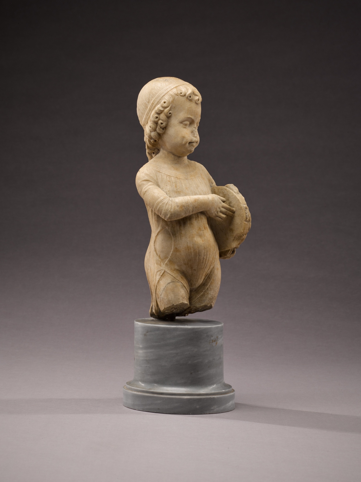 Artwork by Antonio Rizzo, Child with tambourine, Made of marble, on a later grey marble base