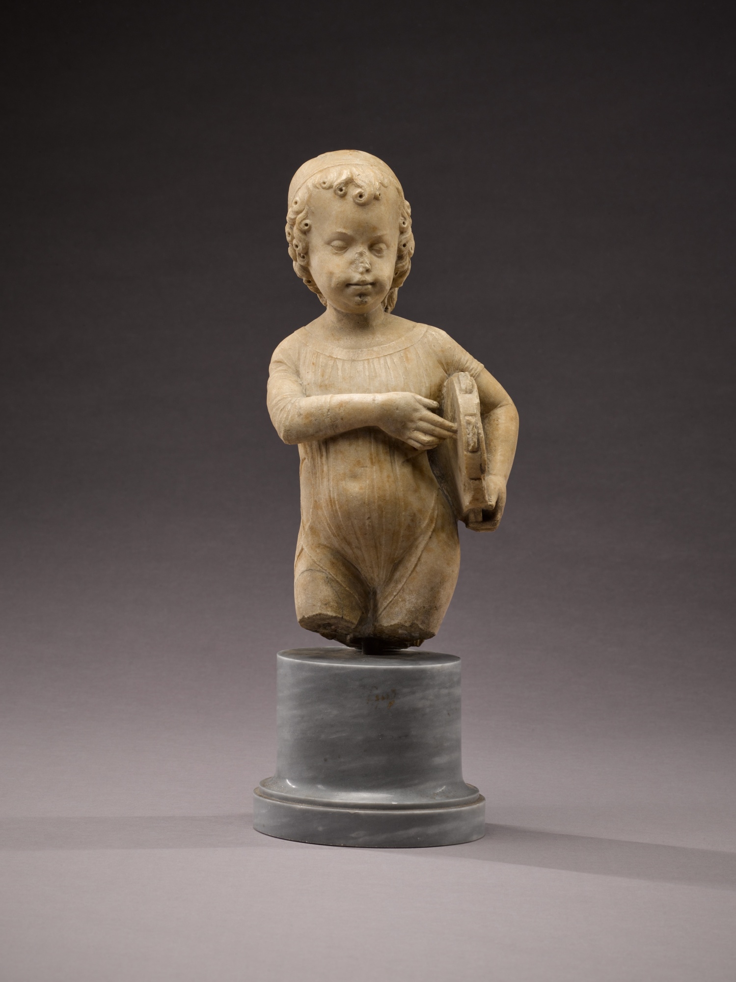 Artwork by Antonio Rizzo, Child with tambourine, Made of marble, on a later grey marble base